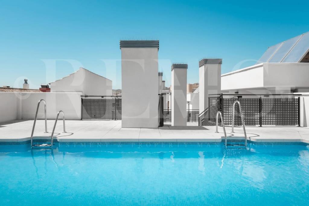 The swimming pool at or close to Cozy apartment with parking in the center by REMS