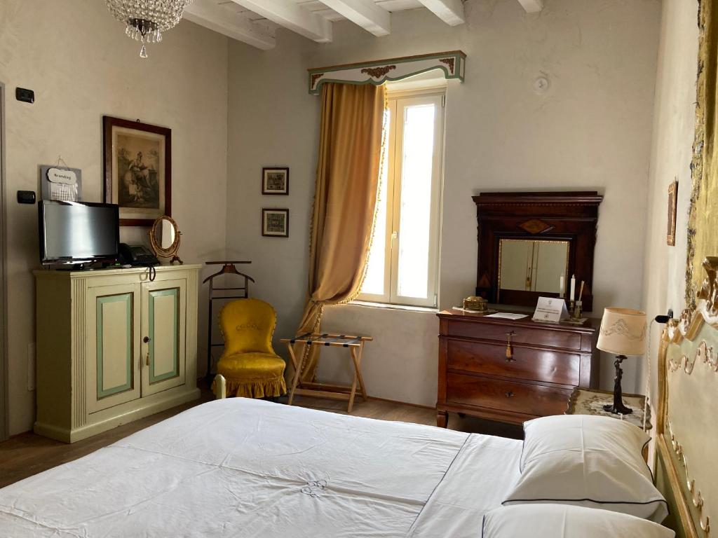Postel nebo postele na pokoji v ubytování B&B Corte Seguini