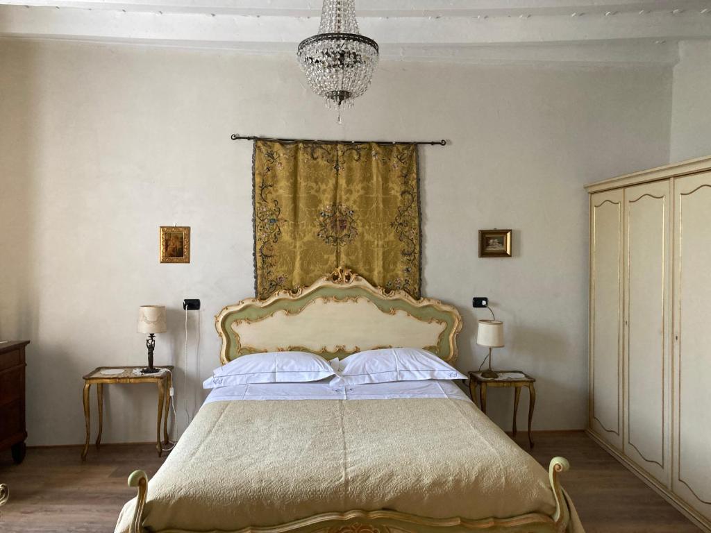 Postel nebo postele na pokoji v ubytování B&B Corte Seguini