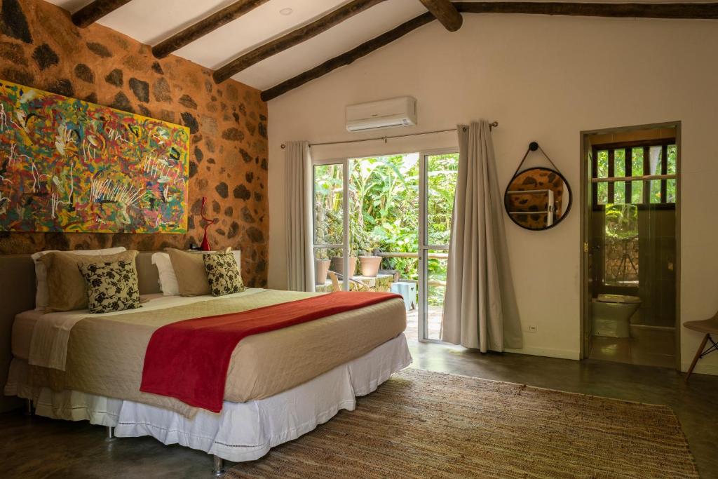 Postel nebo postele na pokoji v ubytování Hotel Boutique Ananas