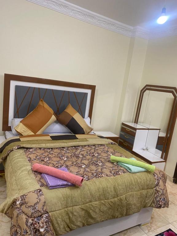 Postel nebo postele na pokoji v ubytování Sunrise shiny Nubian Guest House