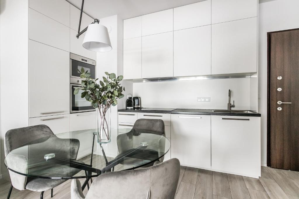Kuchyňa alebo kuchynka v ubytovaní Mennica Residence Deluxe