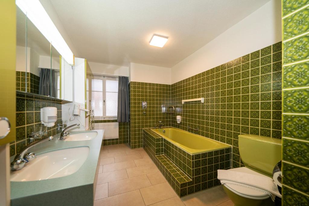 Koupelna v ubytování Hotel Post