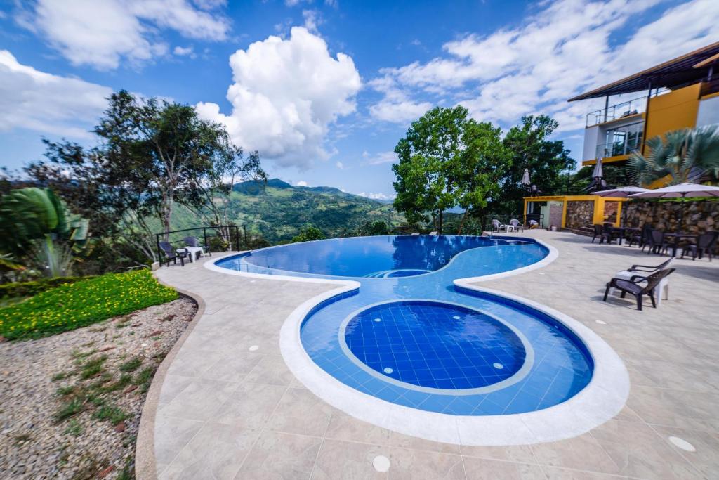 Bazén v ubytování Tambo Eco Hotel nebo v jeho okolí