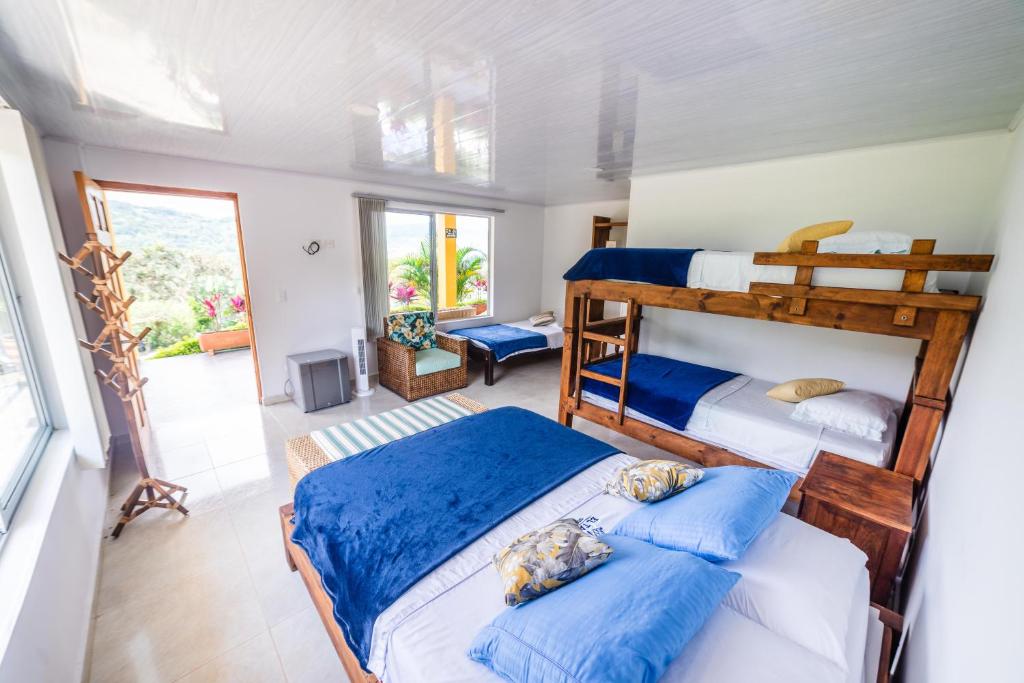 Postel nebo postele na pokoji v ubytování Tambo Eco Hotel