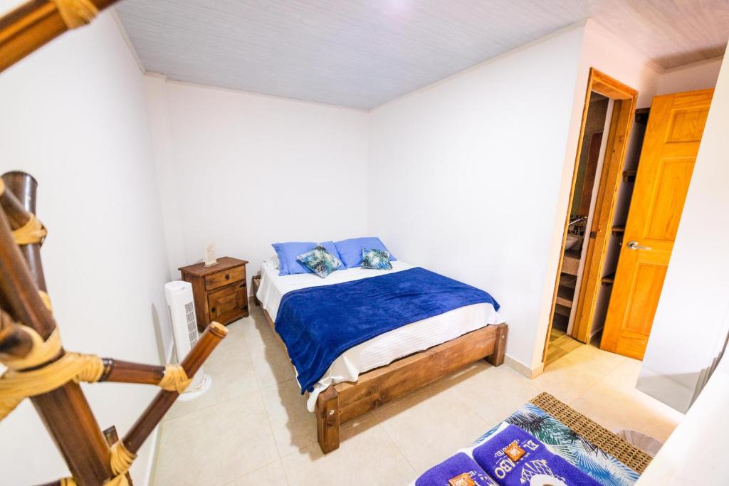 Postel nebo postele na pokoji v ubytování Tambo Eco Hotel
