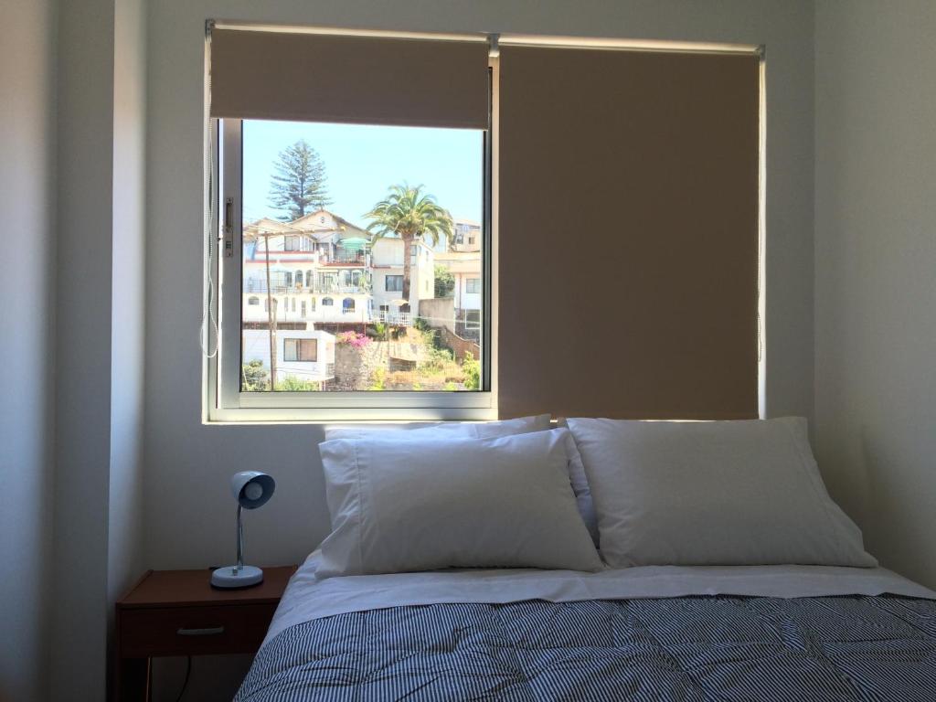 Postel nebo postele na pokoji v ubytování Hostal Recreo