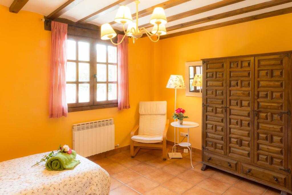 Postel nebo postele na pokoji v ubytování Casa Fresneda