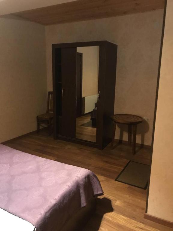 Postel nebo postele na pokoji v ubytování Hotel David Zhorzholiani