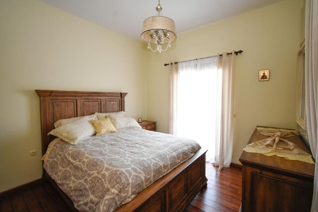 Posteľ alebo postele v izbe v ubytovaní Vlihadia Bay Luxury Villa