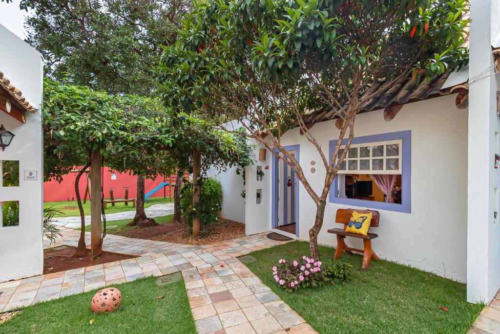 Zahrada ubytování Casinha Ipê Roxo - Condomínio Quinta do Rosário