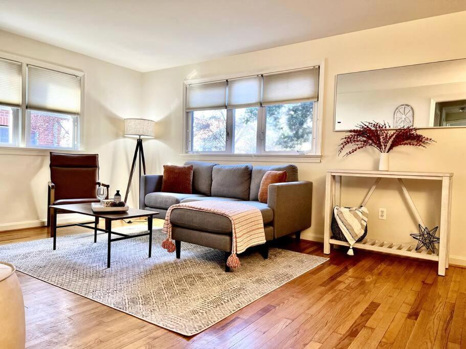 a living room with a couch and a fireplace at NEW 3 BRD Modern Urban Gateway in Arlington