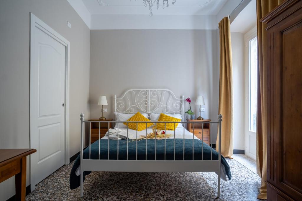 Postel nebo postele na pokoji v ubytování CORVETTO rooms