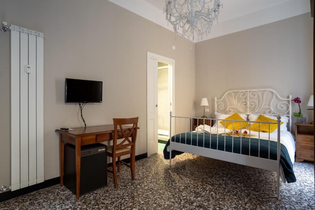 Postel nebo postele na pokoji v ubytování CORVETTO rooms
