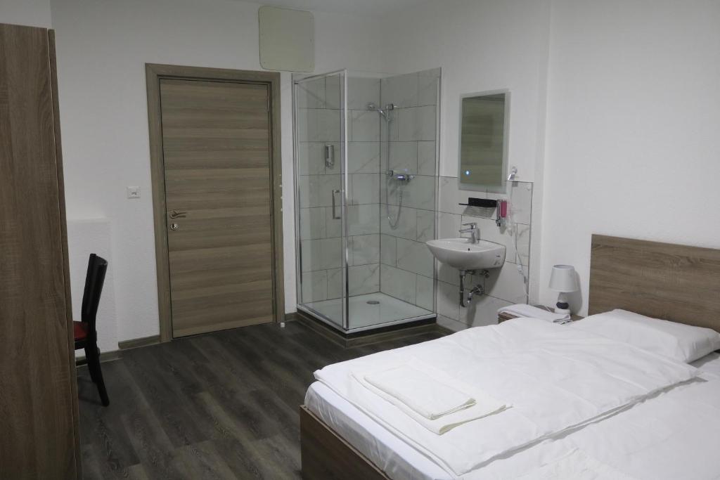 Postel nebo postele na pokoji v ubytování Hotel da Luca