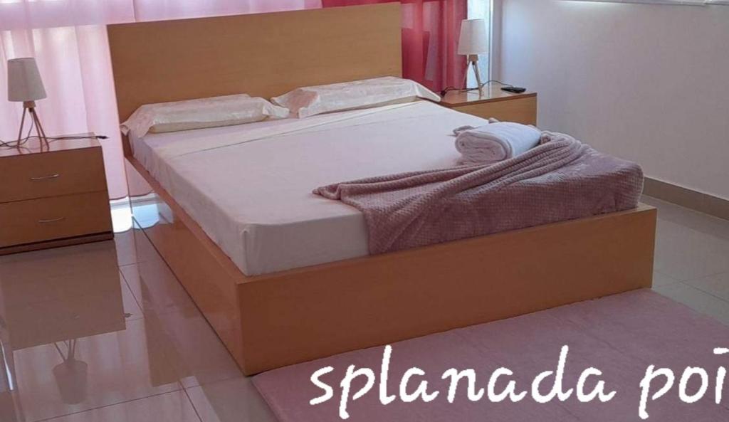 Postel nebo postele na pokoji v ubytování Splanada poilon