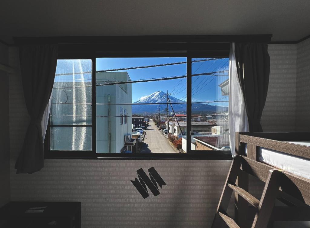 a view of a mountain through a window at SAMURISE 81INN - Vacation STAY 60974v in Azagawa