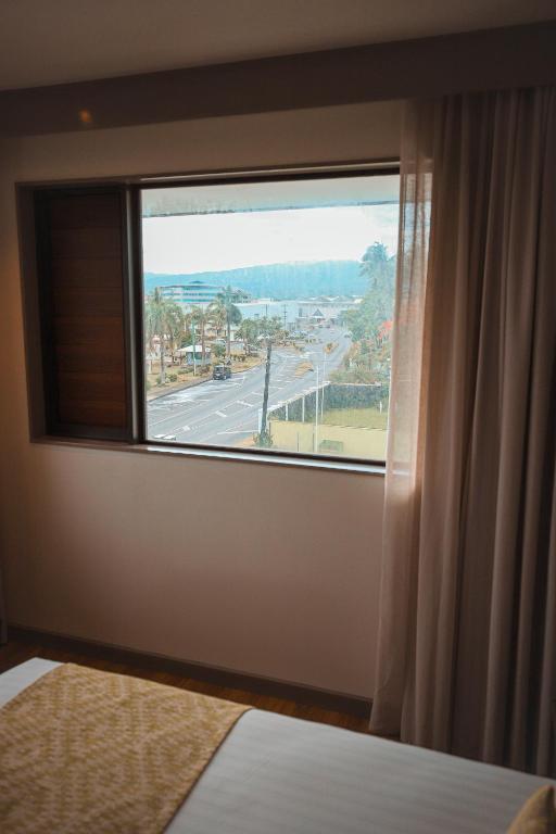 Postel nebo postele na pokoji v ubytování Lava Hotel
