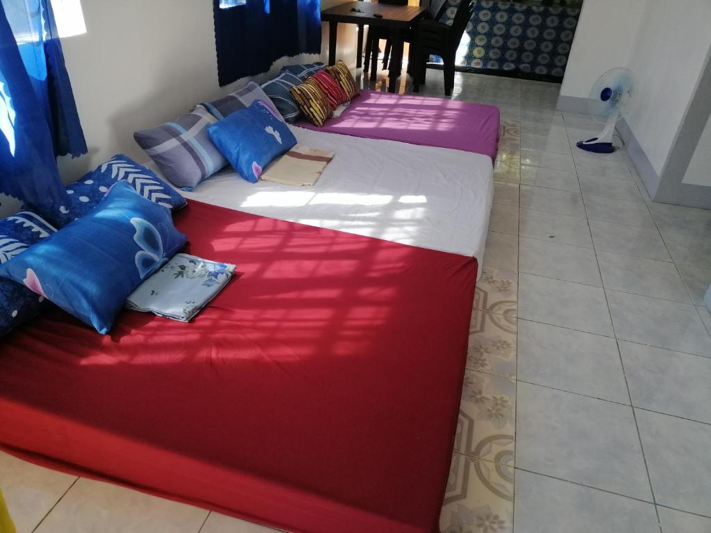 Postel nebo postele na pokoji v ubytování C&V Transient House