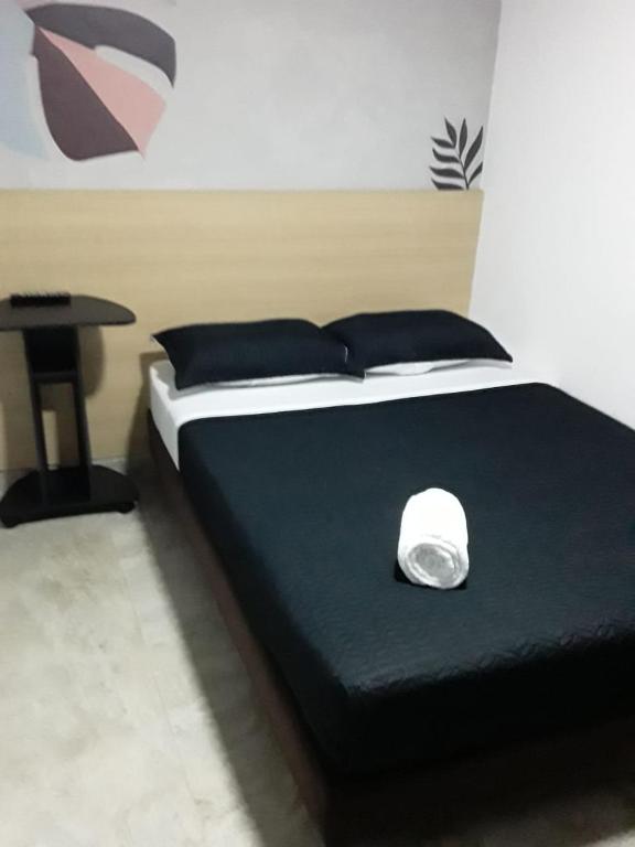Postel nebo postele na pokoji v ubytování Primavera Hotel