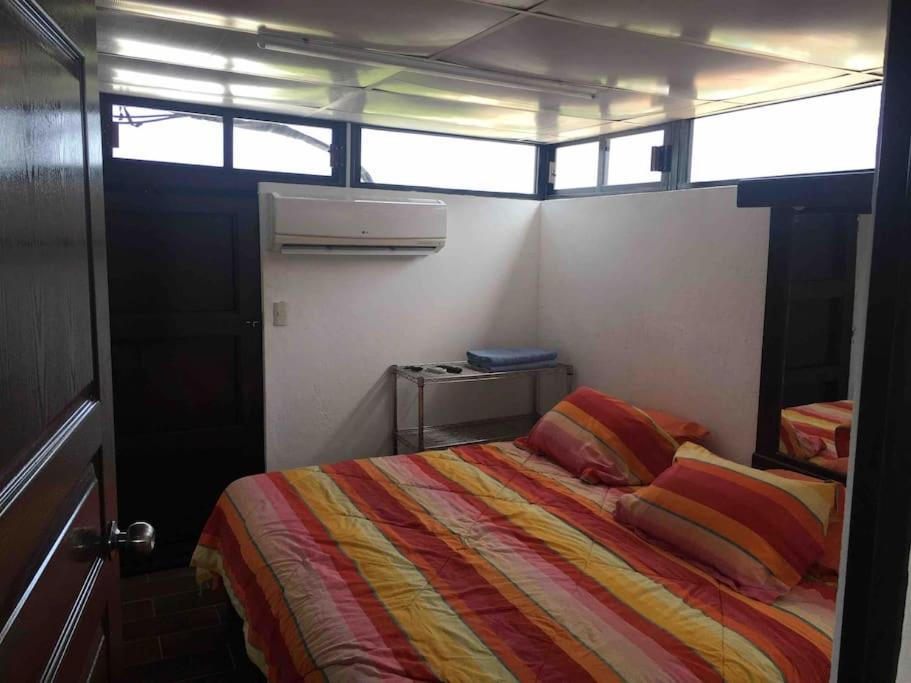 Krevet ili kreveti u jedinici u objektu SUITE CLIMATIZADA Y EQUIPADA Zona Dorada Tuxtla