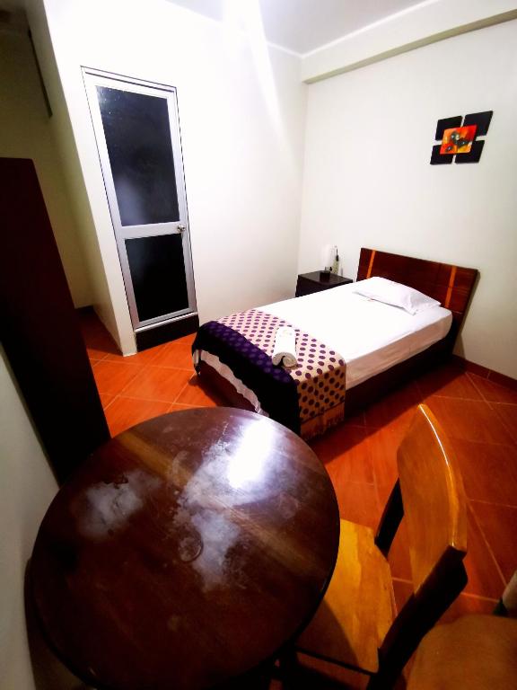 Postel nebo postele na pokoji v ubytování Hostal "Vista del Valle"