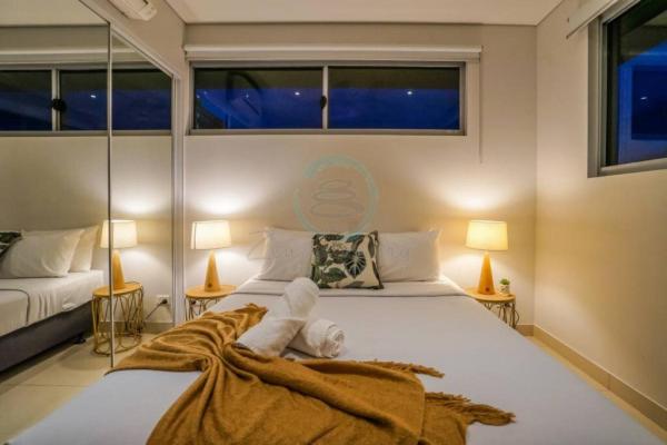 Letto o letti in una camera di ZEN CENTRAL Ambient 3BR Apt in the Heart of Darwin