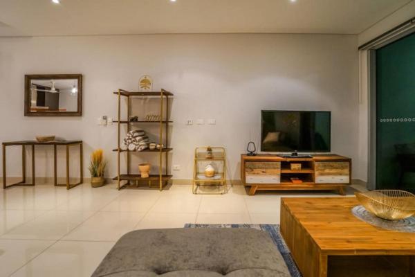 TV o dispositivi per l'intrattenimento presso ZEN CENTRAL Ambient 3BR Apt in the Heart of Darwin