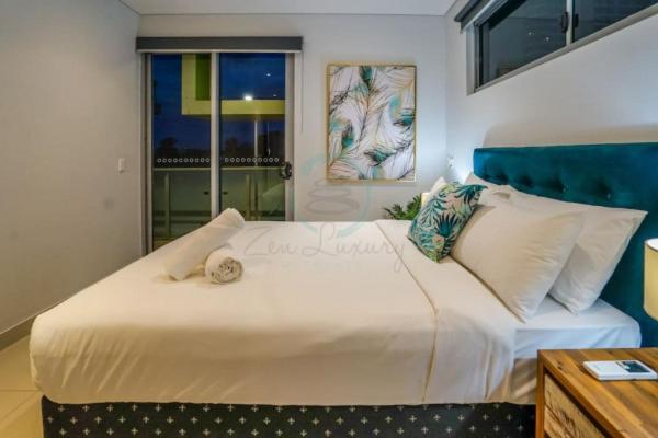 Letto o letti in una camera di ZEN CENTRAL Ambient 3BR Apt in the Heart of Darwin