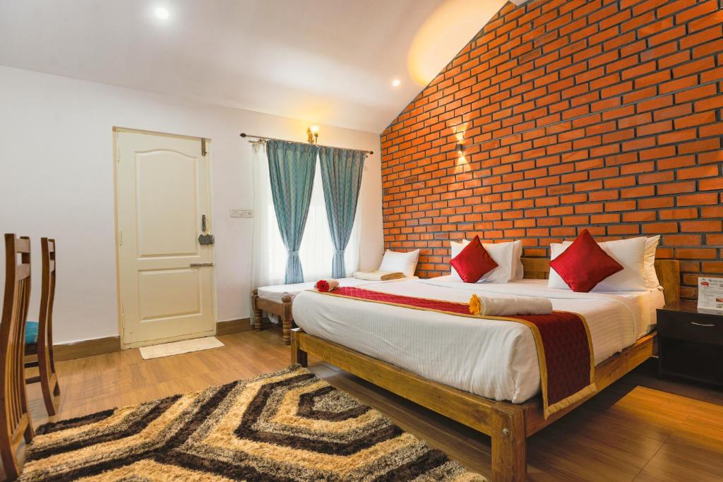 Postel nebo postele na pokoji v ubytování The Spectrum Resort - Chikmagalur