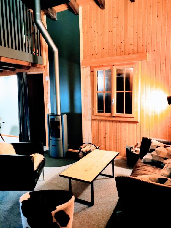 Posezení v ubytování Ferienwohnung im Chalet am Bach