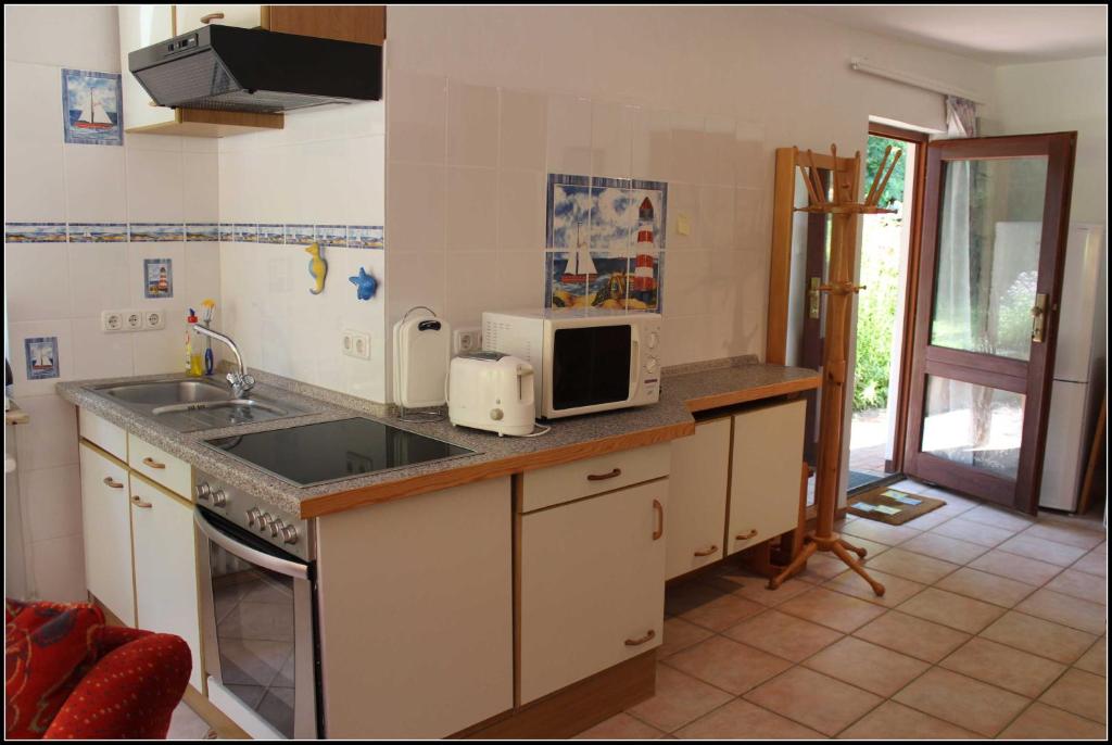 Kuchyň nebo kuchyňský kout v ubytování Ferienwohnung Fohrmann
