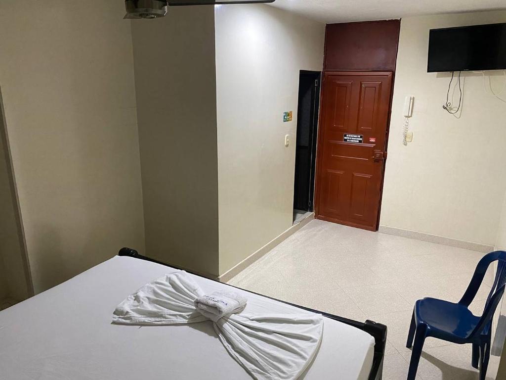 Postel nebo postele na pokoji v ubytování Hotel Villa Grant