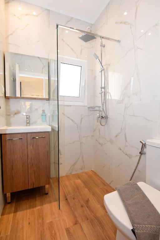 A bathroom at Rubini City Apartment