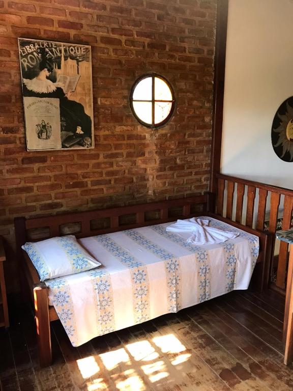 Postel nebo postele na pokoji v ubytování VILA LUMAR