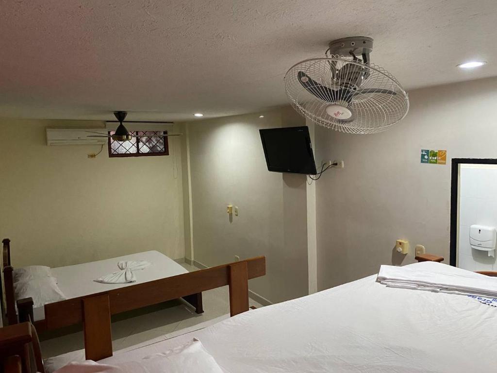 Postel nebo postele na pokoji v ubytování Hotel Villa Grant