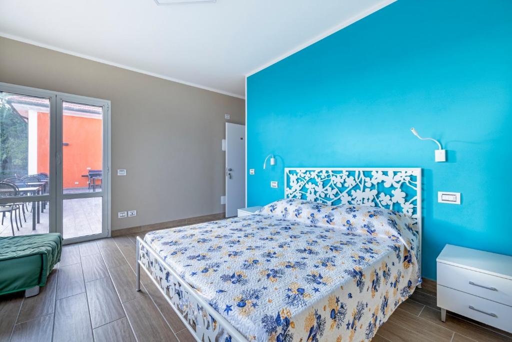 Łóżko lub łóżka w pokoju w obiekcie Agriturismo Cascina Trevo