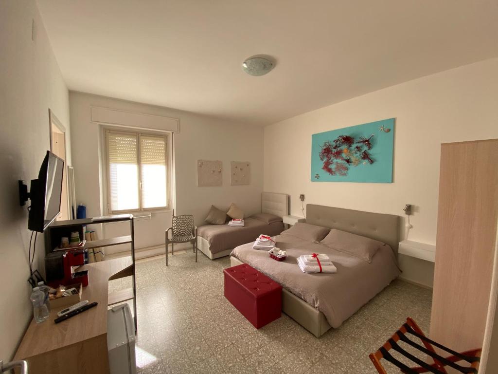 TV a/nebo společenská místnost v ubytování Rossocorallo Rooms