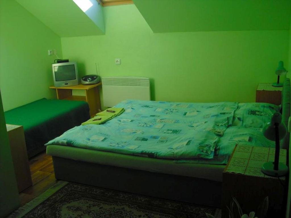 Postel nebo postele na pokoji v ubytování Penzion u Balcarky
