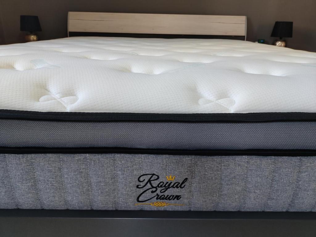Posteľ alebo postele v izbe v ubytovaní Silver Pearl Apartment