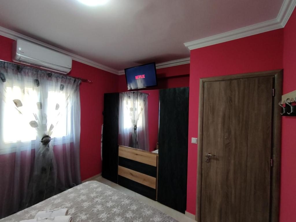 Posteľ alebo postele v izbe v ubytovaní Silver Pearl Apartment