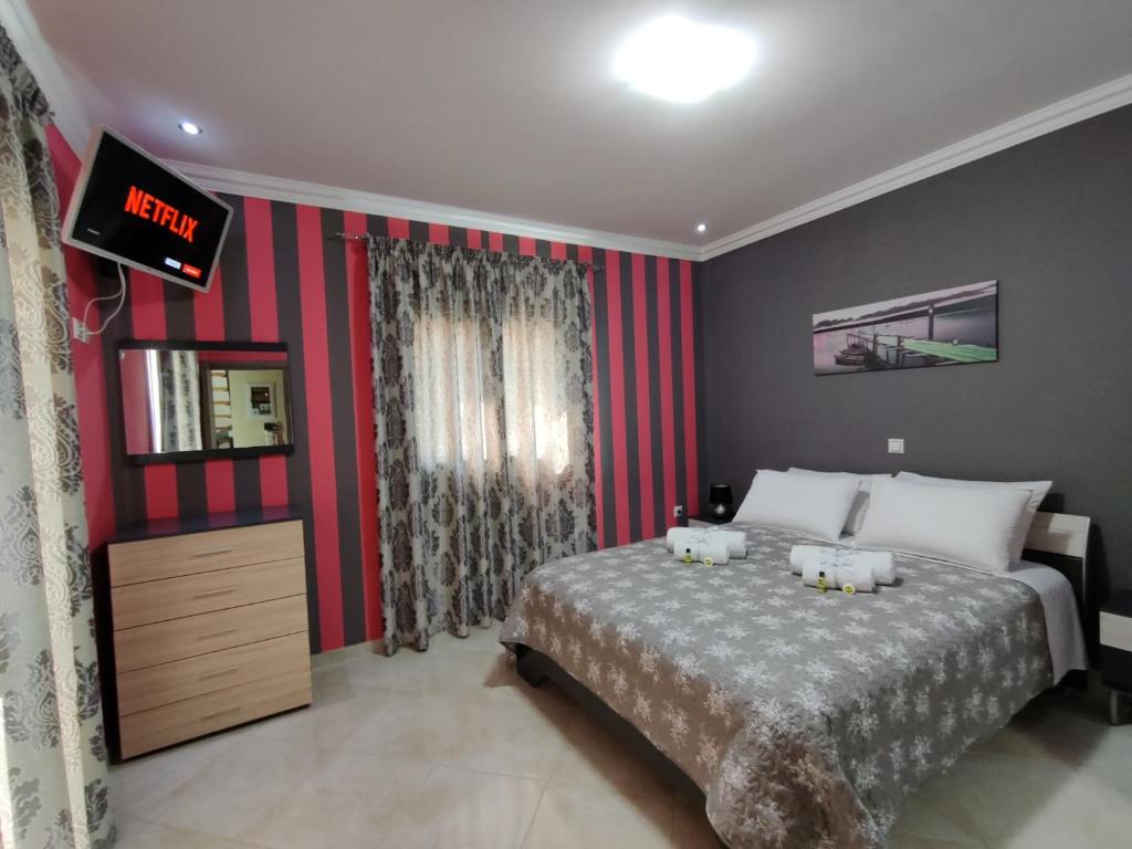 Posteľ alebo postele v izbe v ubytovaní Silver Pearl Apartment