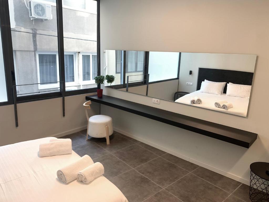 Posteľ alebo postele v izbe v ubytovaní M17 Studios & Suites in the Heart of Athens