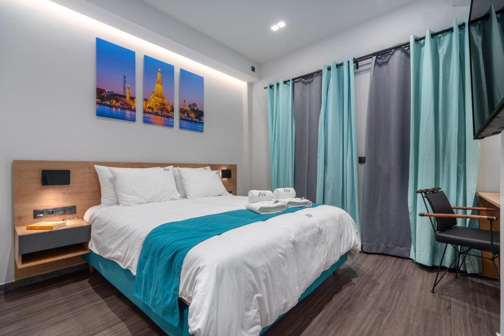 A bed or beds in a room at Exarchia House Project
