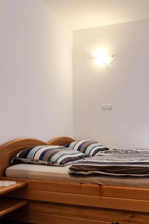 Postel nebo postele na pokoji v ubytování Farm Stay Loger