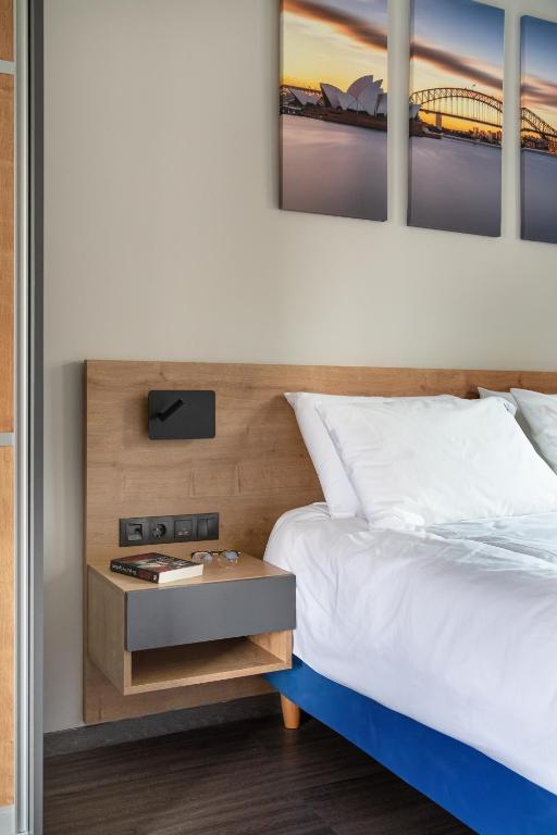 A bed or beds in a room at Exarchia House Project