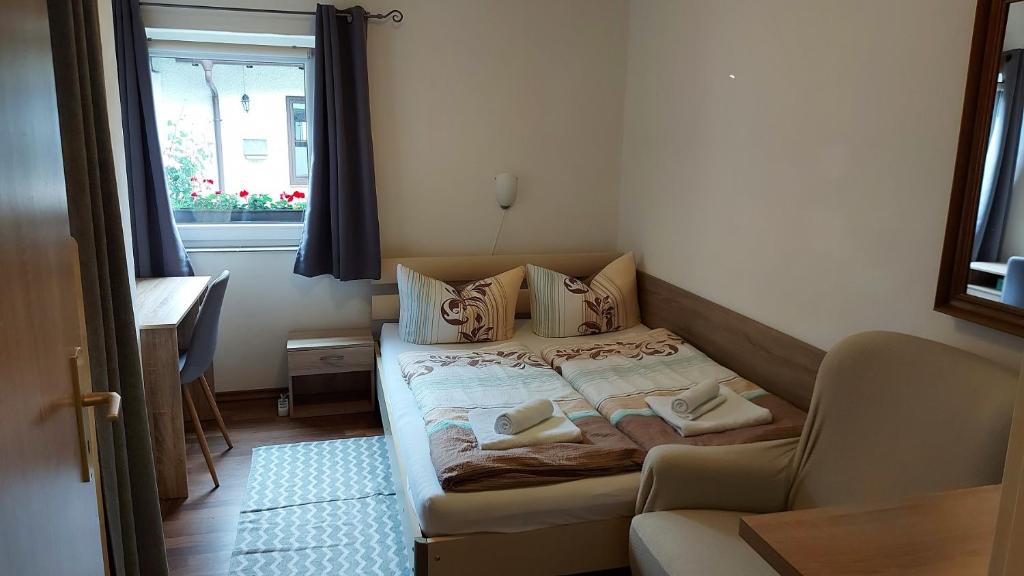 Postel nebo postele na pokoji v ubytování Pension Rauschberghof