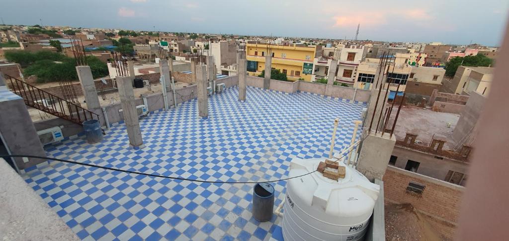 a view of a blue and white tile floor on a building at Hotel Subham Residency and Restaurant in Bikaner