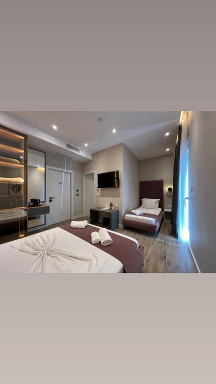 Domus Hotel & Apartments - Habitación Triple De Lujo
