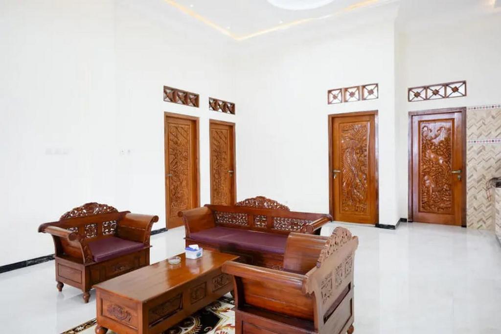 Area soggiorno di Griya Mataram Kotagede Mitra RedDoorz